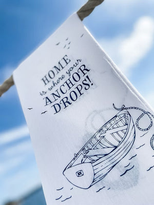 Tea towel home is where your anchor drops hanging on rope