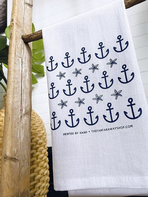 Good Times in the Maritimes Towel The Far Far Away Shop hanging on wooden bar