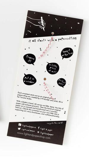 Light + Paper Beaver and Moose Ornaments packaging back cover