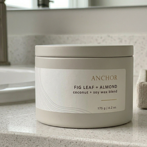 Anchor fig leaf + almond candle on bathroom counter