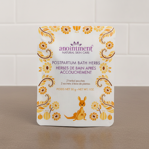 Anointment postpartum bath herbs on brown counter