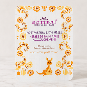 Anointment postpartum bath herbs on marble surface