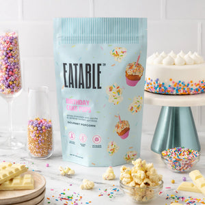 Eatable Birthday Cake Pops Popcorn surrounded by treats