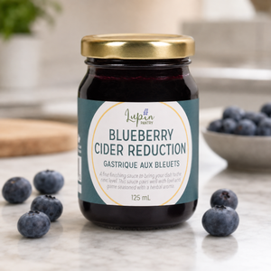Blueberry Cider Reduction Lupin on kitchen table with blueberries