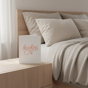 Stevie and Bean Sleepless AF card on nightstand