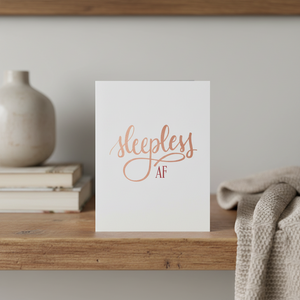 Stevie and Bean Sleepless AF card on shelf