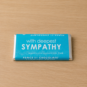 With Deepest Sympathy Chocolate Bar on desk