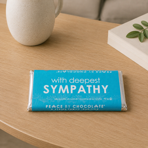 With Deepest Sympathy Chocolate Bar on coffee table