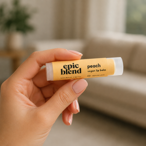 Vegan peach lip balm Epic Blend in woman's hand