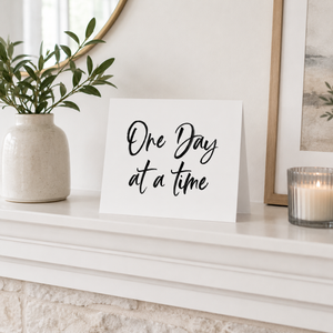 One Day at a Time card Pretty by Her on mantle