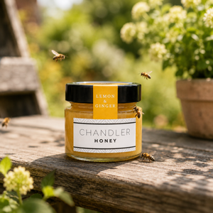 Chandler Honey Lemon Ginger Honey outside with bees