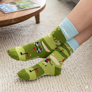 Friday Sock Co Women's Golf Socks woman wearing in living room