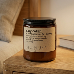 Cozy Cabin Soy Candle onefive1 on bedside table