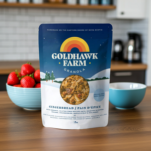 Goldhawk Farm gingerbread granola on kitchen table with strawberries