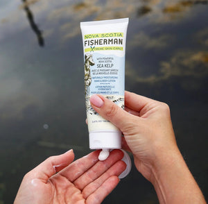 Nova Scotia Fisherman Hand and Body Lotion being squeezed onto woman's hand