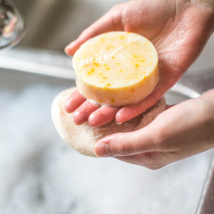 Anointment Baby Calendula Soap in person's hands