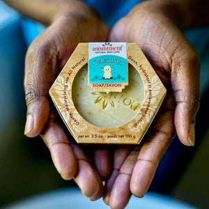 Anointment Baby Calendula Soap in packaging in person's hands