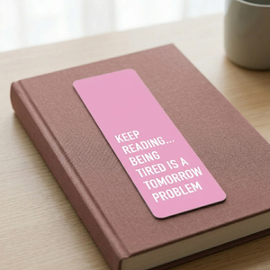 Keep Reading Tired Tomorrow Problem bookmark on a book