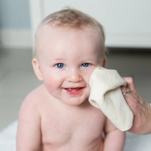 Lulujo organic cotton washcloths with baby