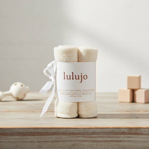 Lulujo organic cotton washcloths on table