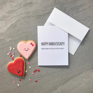 Stevie and Bean Happy Anniversary Card beside heart cookies