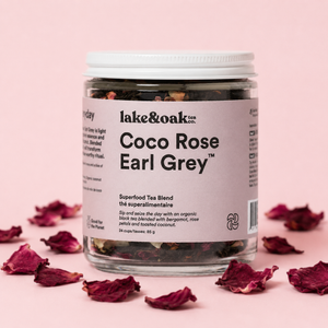 Lake & Oak Coco Rose Earl Grey pink background with dried rose petals