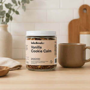 Lake & Oak Vanilla Cookie Calm Superfood Tea Blend beside brown mug