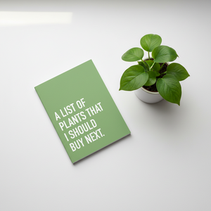 List of Plants Pocket Notebook beside plant