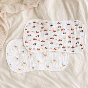 Lulujo burp cloths farm and chicks on bed sheets