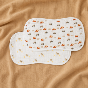 Lulujo burp cloths farm and chicks on tan blanket