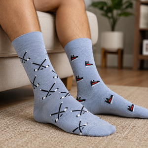 Men's Hockey Socks by Friday Sock Co on man's feet on couch