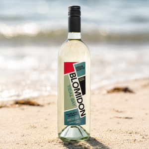 Blomidon Tidal Bay White Wine on beach