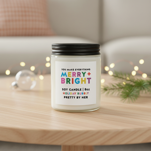 Merry and Bright soy candle Pretty by Her in front of Christmas decor