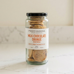 Milk chocolate orange shortbread cookies on counter