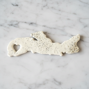 Nova Scotia fridge magnet with marble background
