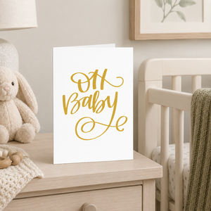 Oh Baby Card Stevie and Bean on nightstand beside crib