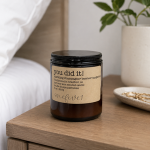 OneFive1 You Did It Candle on bedside table