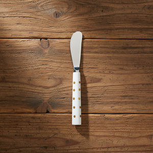 Abbott Pate Spreader with Gold Dots on wooden table