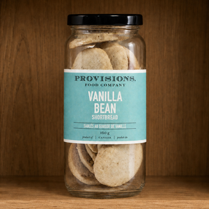 Provisions Vanilla Bean Shortbread Cookie Jar on shelf in pantry