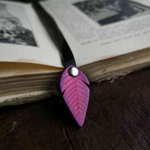 Hammerthreads Pink Leather Feather Bookmark in book