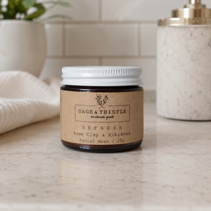 Sage & Thistle Refresh Facial Mask on bathroom counter beside soap