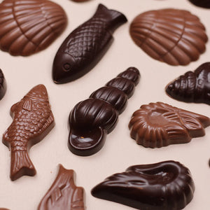 Rousseau chocolate sea beings displayed out of box