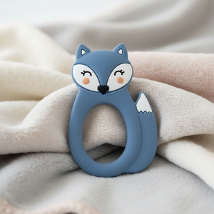 Blue fox silicone teether on blanket