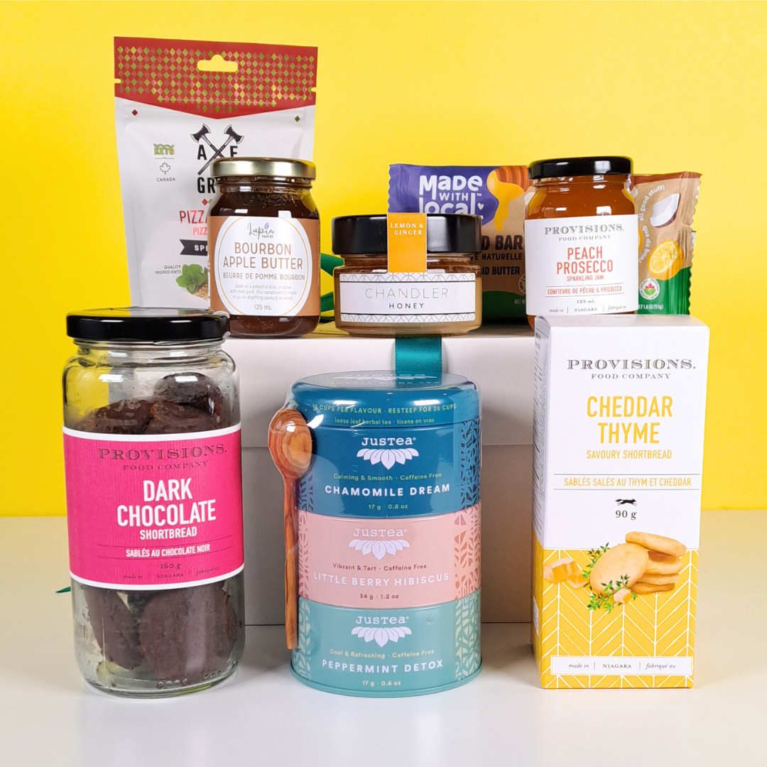 Snacks and Sips Canadian gift basket with jams, cookies, tea and snacks