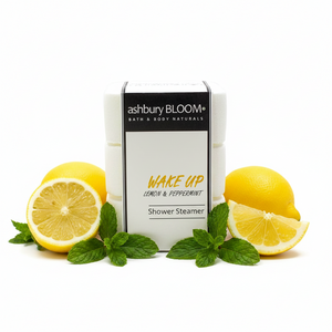 Ashbury Bloom Wake Up shower steamers staged with lemons and peppermint leaves 