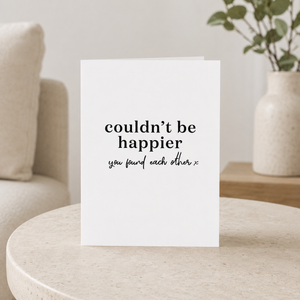 Wrinkle and Crease Couldn't Be Happier Card on end table beside couch