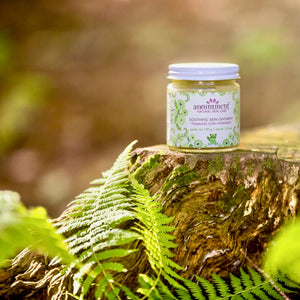 Anointment Baby Soothing Skin Ointment on tree trunk