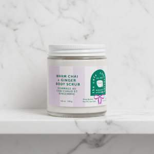 warm chai and ginger body scrub Midnight Paloma on bathroom shelf
