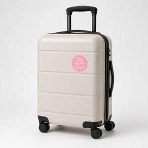 Vinyl sticker cool mom club on off-white suitcase