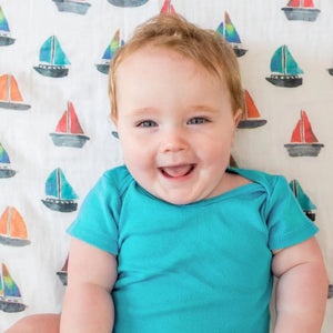 Lulujo swaddle blanket sailboats with baby